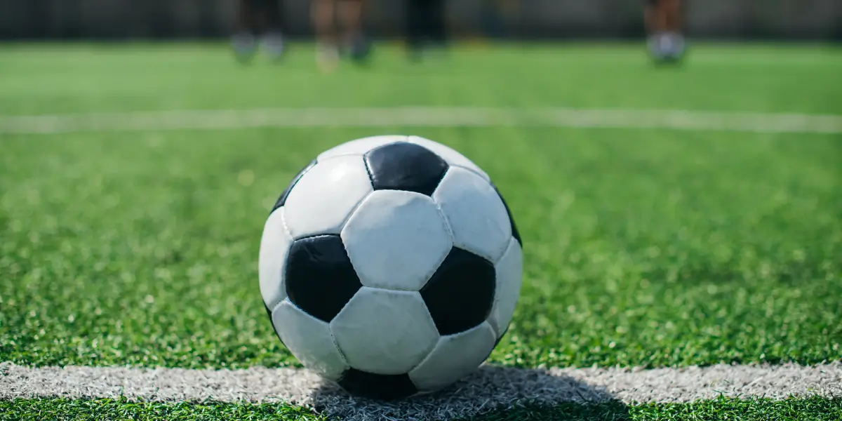 A selective focus photo of a soccer video marketing shoot