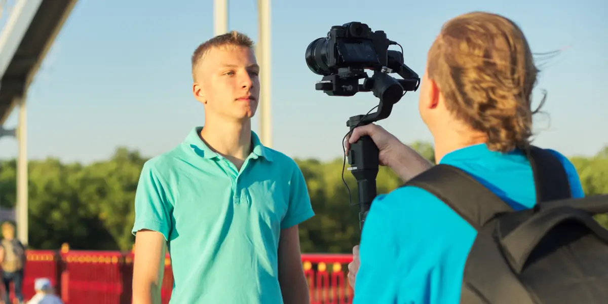 A young athlete does a video recording for social media